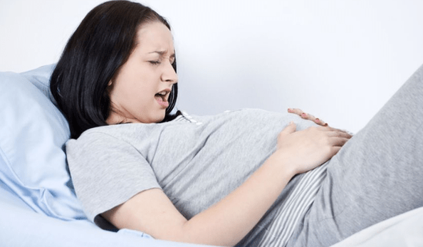боль в животе при глистах во время беременности